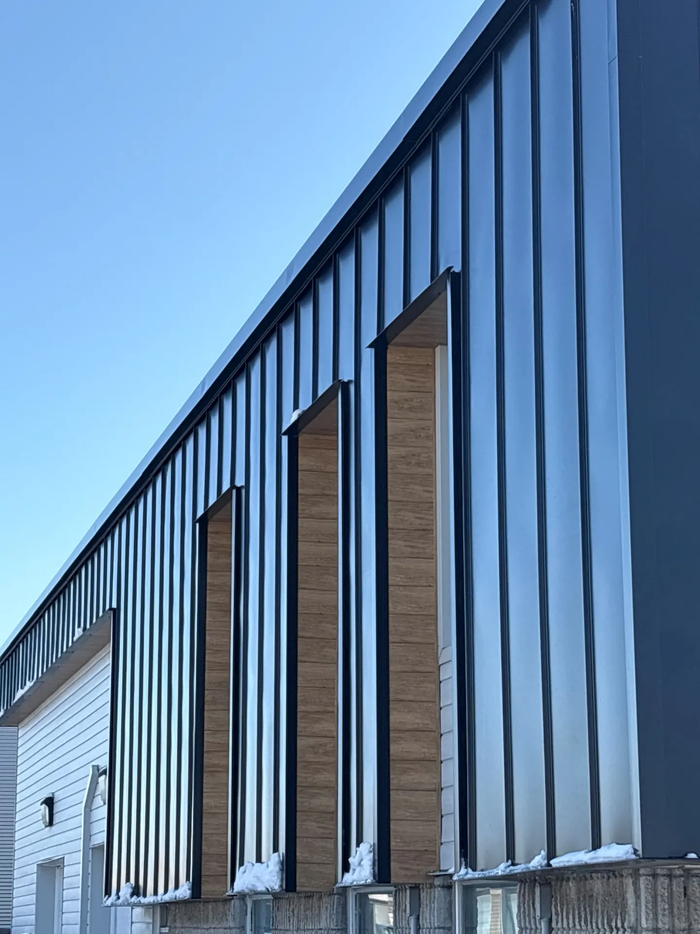 Tôle pour revêtement extérieur